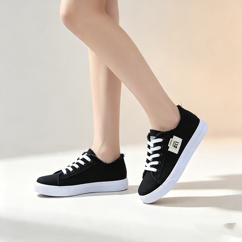 Women's casual canvas lace-up sneakers with frayed edge detailing