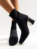 Black stretch sock block-heel ankle boots